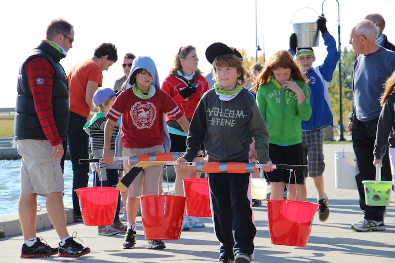 100 people filled buckets from lake to experience Water Walk The