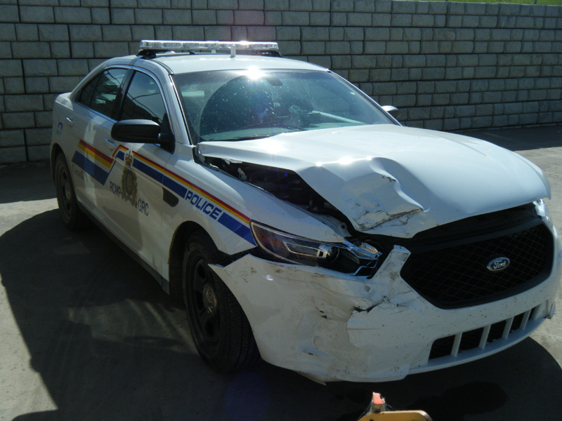 Chestermere RCMP Police vehicle hit after male suspect fled scene pic 1